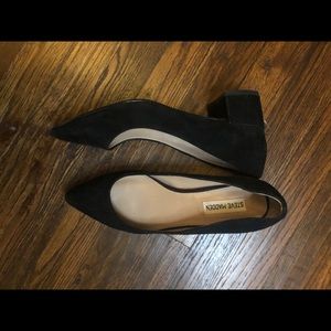 Black short suede heels.